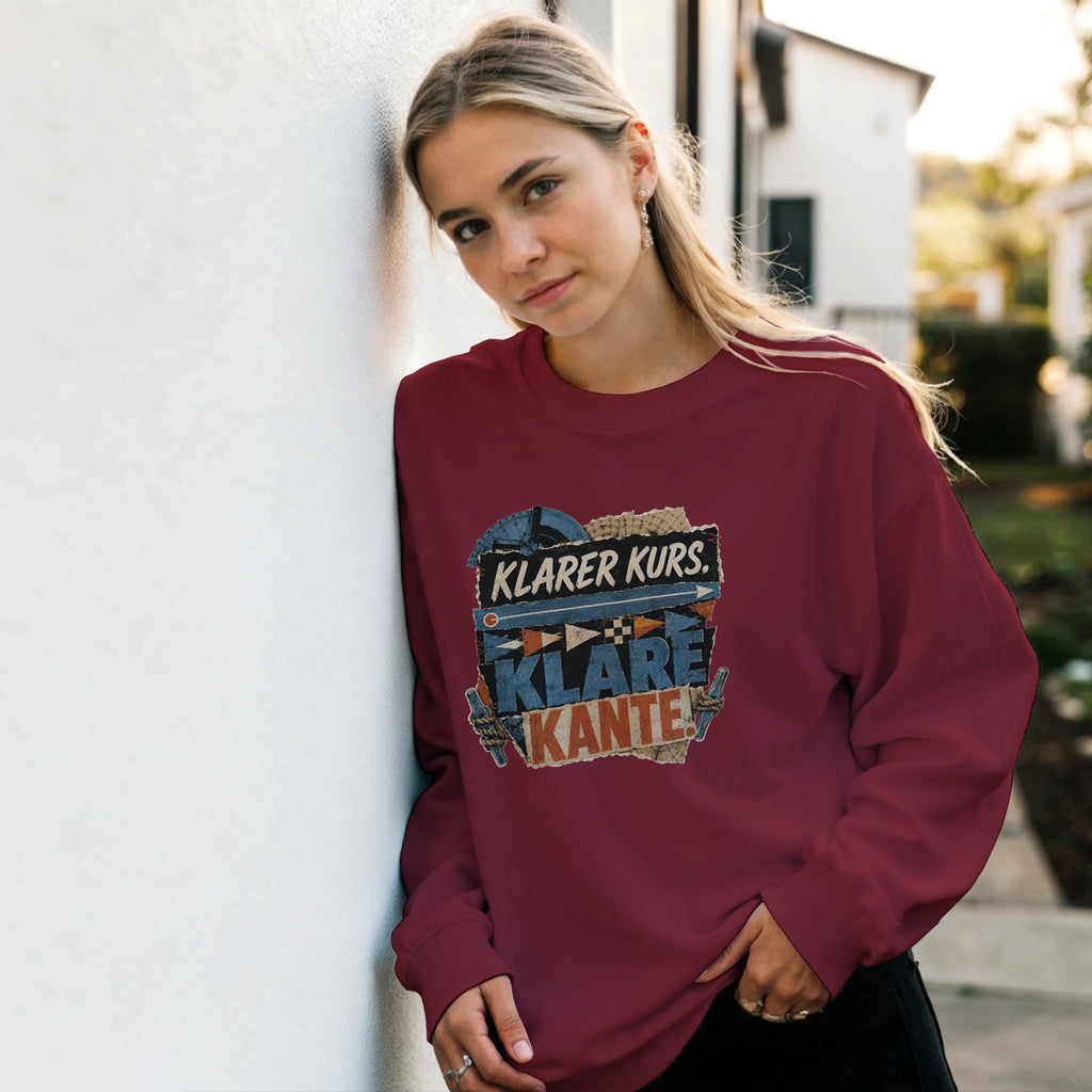 Pullover in Hellrosa mit Motiv „Klarer Kurs. Klare Kante.“